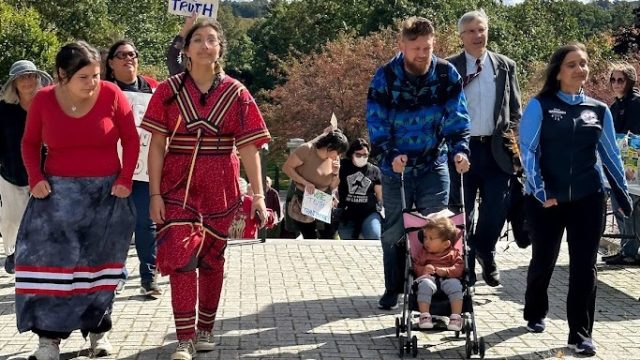 Penobscot Nation Ambassador and Wabanaki Alliance Board President Maulian Bryant's family led off the march. Photo: Anne Henshaw People walking in the Indigenous Peoples' Day march