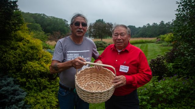 Mi’kmaq Nation Vice Chief Richard Silliboy (right) presented a handmade basket to Darrell Newell (left) in recognition of his service on the Wabanaki Alliance Board of Directors.